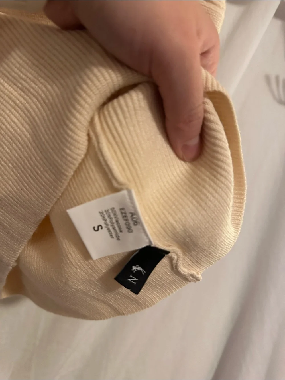 Cream Strapless Twist-Front Knit Top